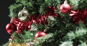 Video of christmas tree with baubles decorations and copy space. Christmas, decorations, tradition and celebration concept.
