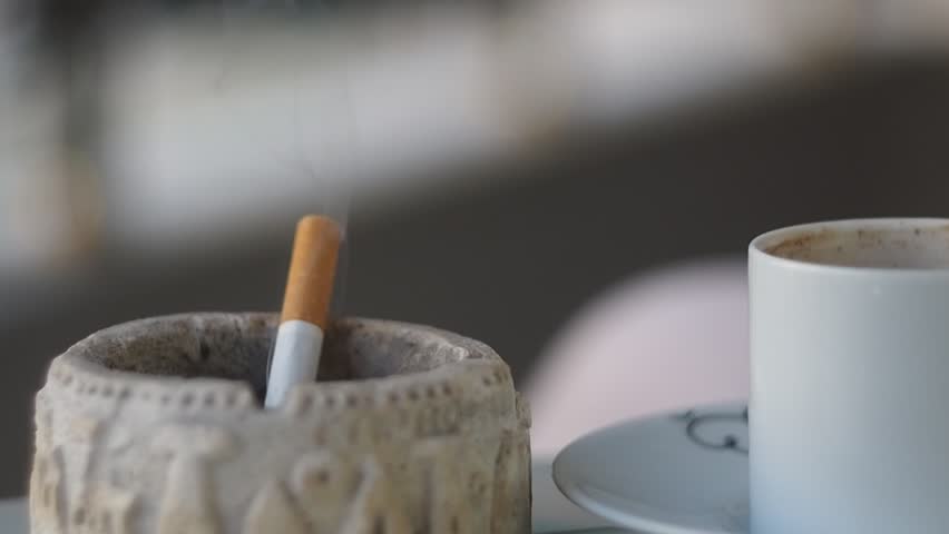 Coffee and cigarette smoking together Royalty-Free Stock Footage #1109918101