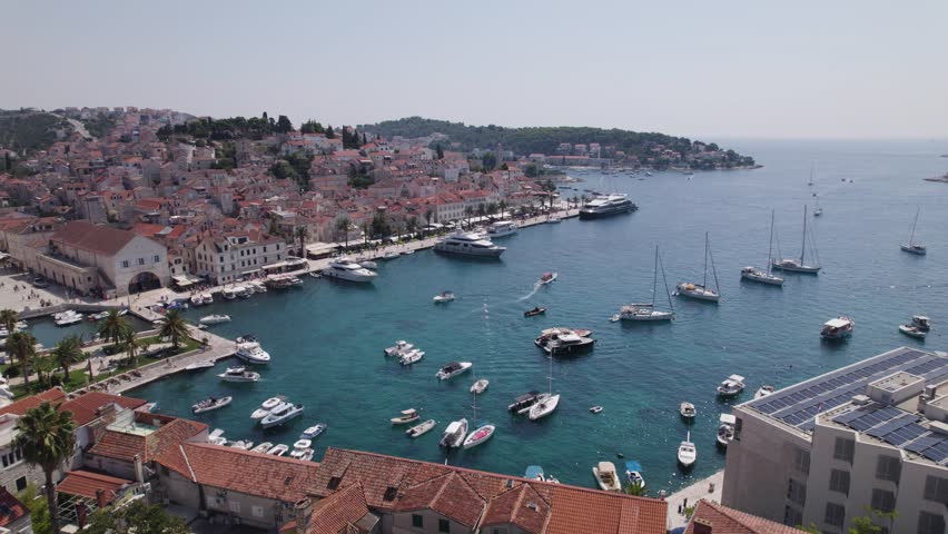 Hvar harbour, small picturesque port on beautiful Island. Croatia, aerial