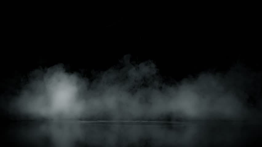Super Slow Motion Shot of Atmospheric Smoke Slowly Floating on Black Background at 1000fps.