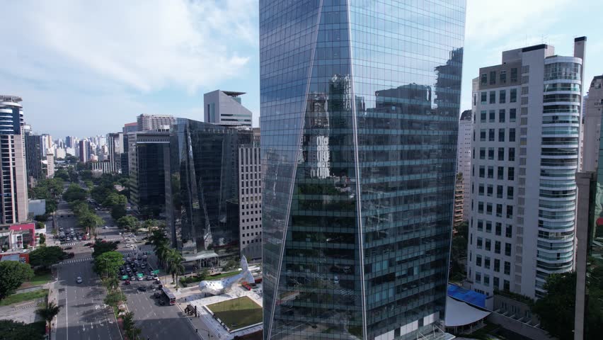 Aerial view of Avenida Brigadeiro Faria Lima, Itaim Bibi. Iconic commercial buildings in the background. With mirrored glass.