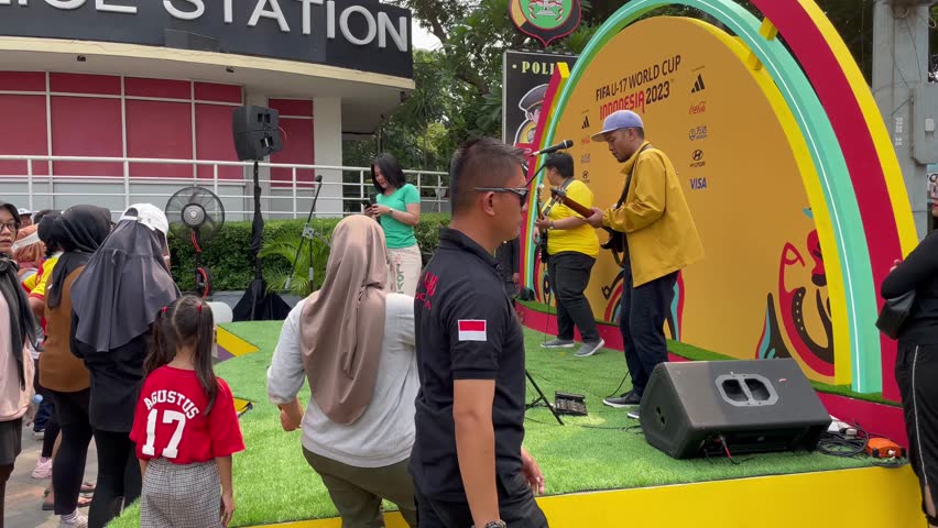 Jakarta, Indonesia. October 15, 2023 - On the day of the car free day event, there was a karaoke and dancing event with the local community.