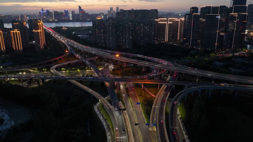 Aerial Video of Traffic Flow at Hangzhou Interchange，Delayed Video，evening peak，sunset，HangZhou China Royalty-Free Stock Footage #1109941689