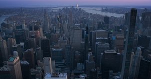 Internet of Things Concept in a Big City. Aerial New York City Footage with Animated Grid Connecting Buildings. Online Internet Icons Representing Cloud Computing, Gaming, Navigation and Others - Powered by Shutterstock - Get 15% off with code: PIKWIZARD15