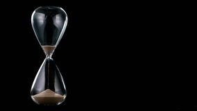 Sands move through hour glass, super slow motion filmed on high speed cinematic camera at 1000 fps - Powered by Shutterstock - Get 15% off with code: PIKWIZARD15