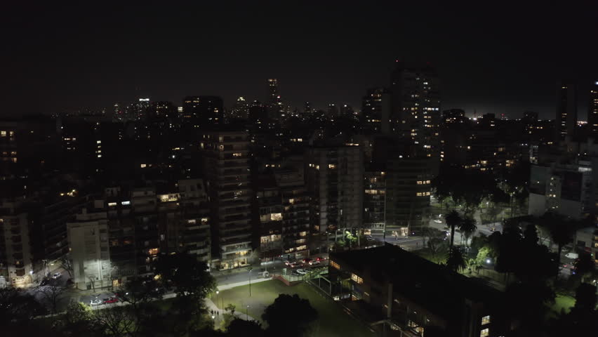Overhead shot de aerial Nighttime View of Buenos Aires Cityscape with Buildings and Park