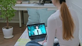 Teenager girl having online video conference therapy with psychologist