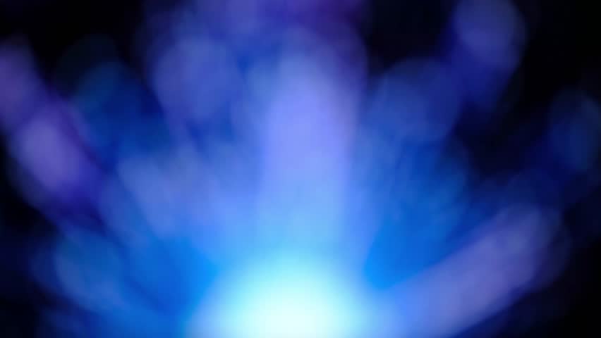 A blue fireball explodes from the center of the screen and spreads across the black background. Makes it look like a hot spring Can be used as background for launch.