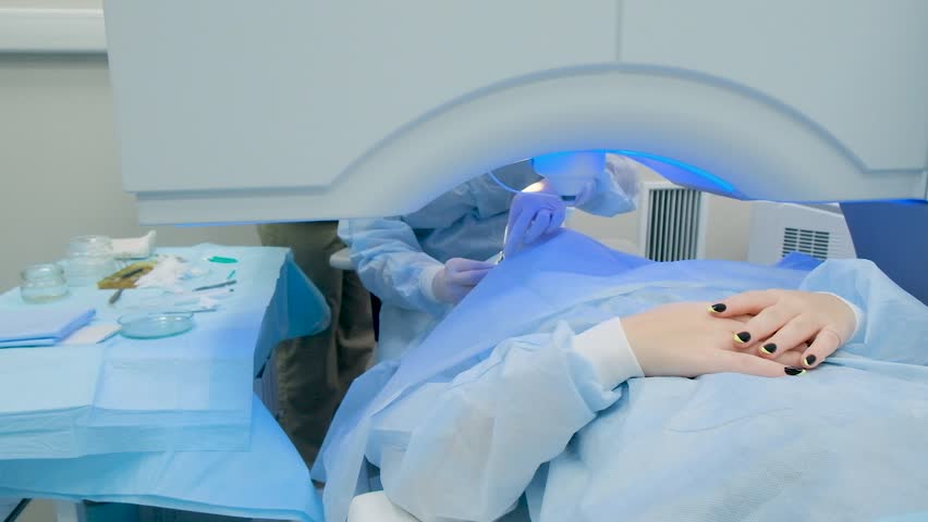 Operating room at a medical center for the treatment of eye diseases. Laser surgery using the SMILE method is underway. Royalty-Free Stock Footage #1109972791