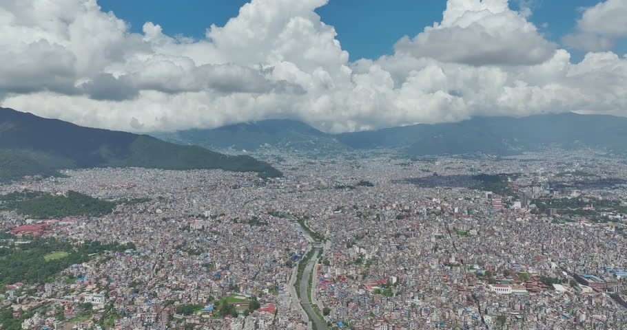 Beautiful Kathmandu City Nepal Under blue cloudy sky Landscapes. Sunny weather with peaceful and clean environment. Highway trails, rivers, Natural resources, colorful Drone shot 4K