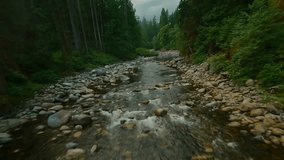 Flight over a mountain river. Shot on FPV drone. British Columbia, Canada. - Powered by Shutterstock - Get 15% off with code: PIKWIZARD15