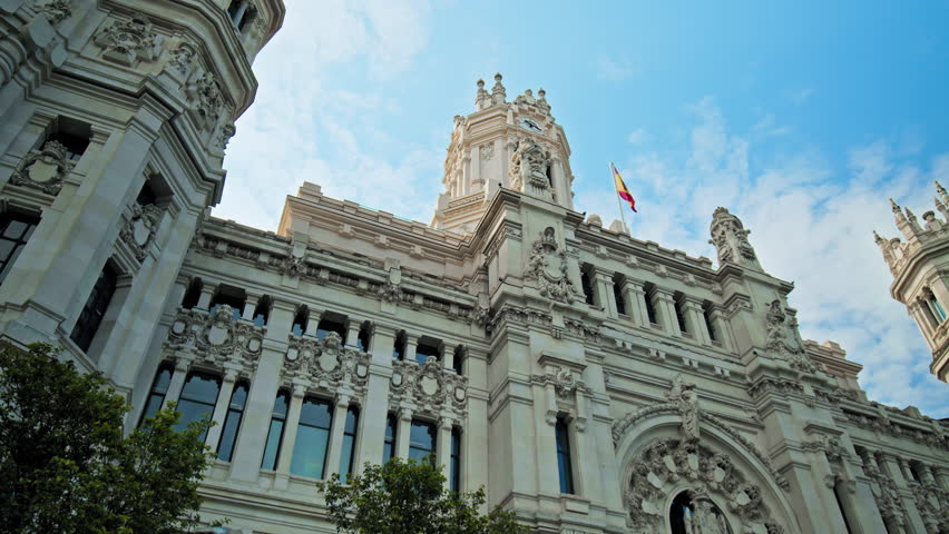 Iconic venue building with a tower with panoramic city views. Beautiful architecture of a Spanish building in the centre of Madrid City, Spain, Europe