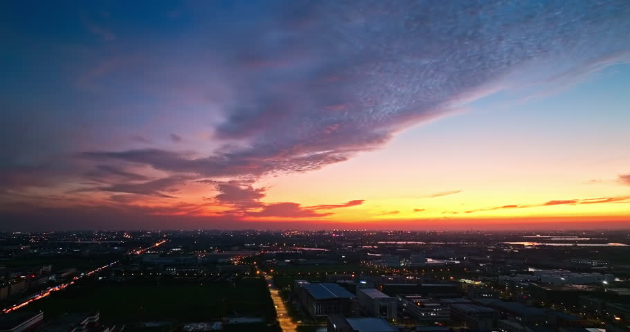 Aerial view beautiful sunset sky clouds and city skyline