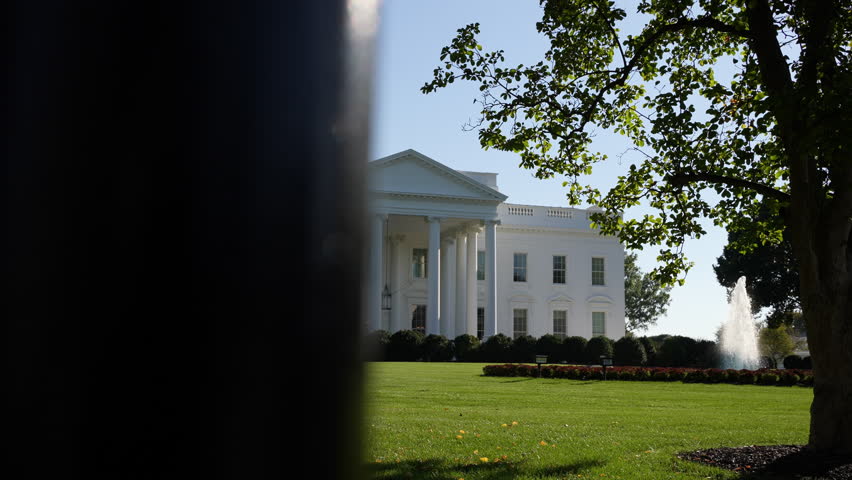 White House From Gate Bars in Slow Motion