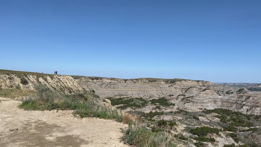 Panning left on  the  badlands hills and mountains in Theodore Roosevelt National Park in North Dakota.
