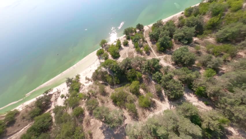 FPV, Ukraine, View from the mountain Pivikha on the Kremenchuk water reservoir near Svitlovodsk, Kirovograd region, Ukraine. Natural background in a sunny summer day.