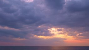 beautiful clouds are moving slowly in the colorful sky at sunset.
Nature video High quality footage. Meditation ocean and sky background.
Majestic sunset or sunrise cloudscape background.