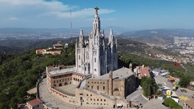drone video Temple Expiatori del Sagrat Cor, Temple of the Sacred Heart of Jesus Barcelona Spain Europe