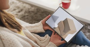 Caucasian woman using tablet at home online shopping on cyber monday sale day, slow motion. Retail business, sale, communication and digital interface digitally generated video.