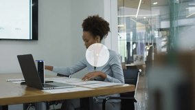 Animation of network of connections with icons over biracial businesswoman in office. Global business, finances, computing and data processing concept digitally generated video.