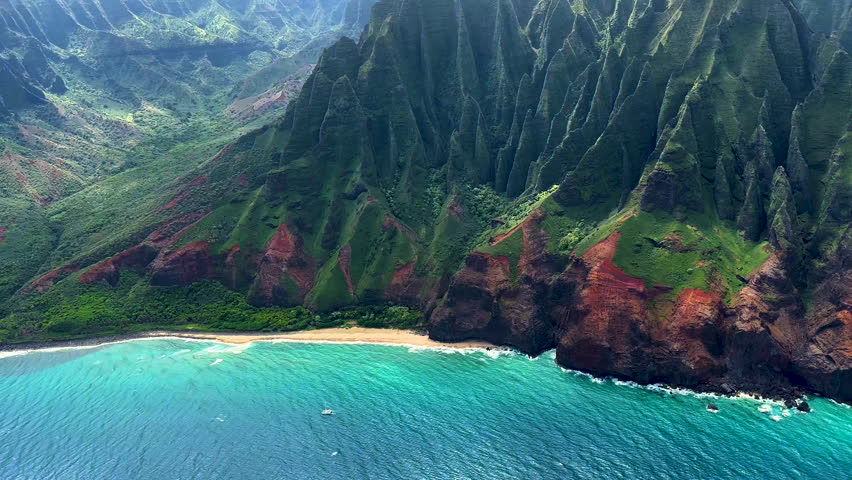 Aerial Na Pali coast State Wilderness Park Kauai Kalalau Trail famous with vacation hikers Hawaii USA travel tourism Royalty-Free Stock Footage #1110037557
