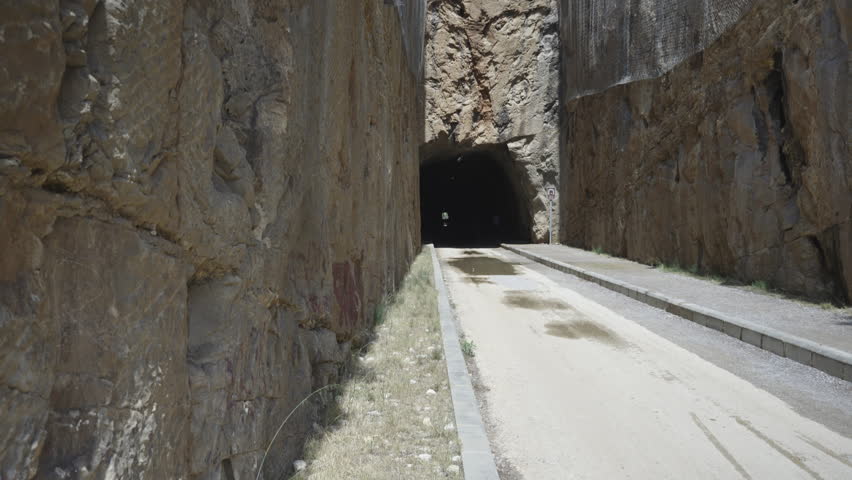 Tunnel in the rocks in the province of Castellon. A favorite place for active walks and bike rides. VIA VERDE BENICASIM OROPESA. Mirador del Bank