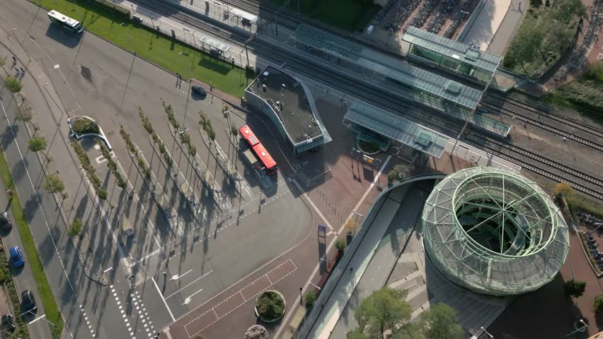 Aerial shot of bus and train station in Alphen aan de Rijn | Shutterstock HD Video #1110044685