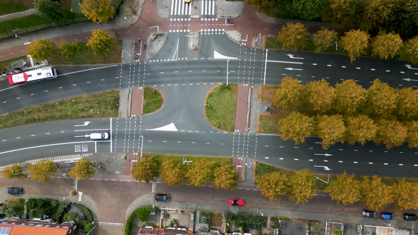 Top view time lapes shot of intersection in Breda | Shutterstock HD Video #1110044897