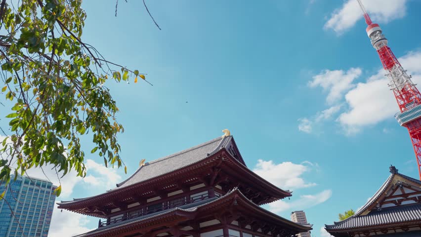 Zojoji Temple and Tokyo tower with beautiful sky. Zojoji Temple and Tokyo tower at autumn in Tokyo, Japan. The popular tourist attractions in Tokyo Japan Royalty-Free Stock Footage #1110048845