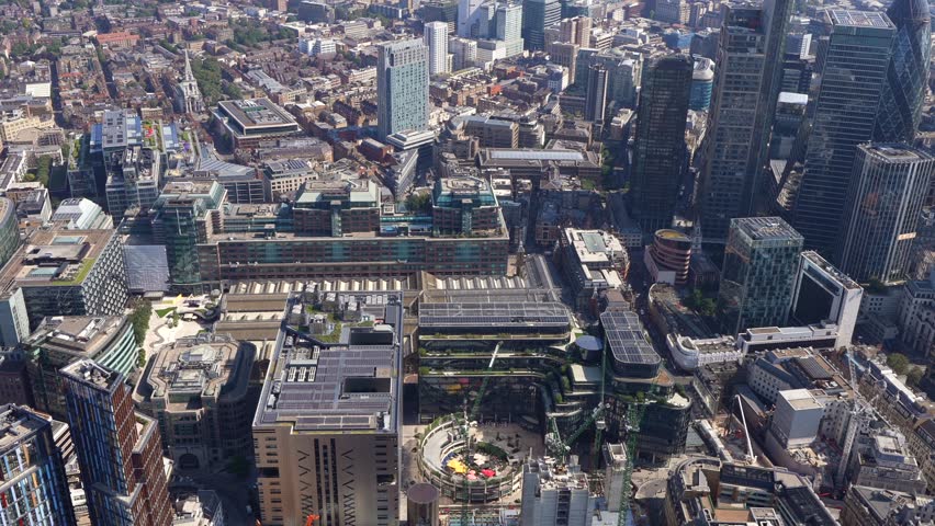 Aerial view of Broadgate and Liverpool Street Station onto the City of London towers. London, UK.