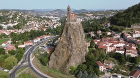 drone video Saint-Michel d'Aiguilhe rock, Rocher Saint-Michel d'Aiguilhe France europe