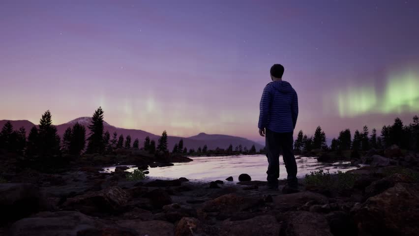 Man Standing outside with Magical Mountain Scene in Nature at night with Aurora in the sky. 3d Rendering landscape. Aerial.