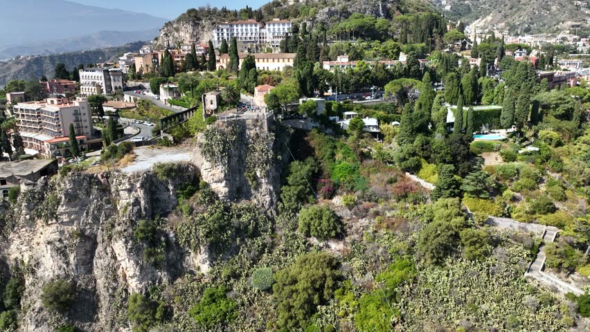 The city of Taormina, Sicily, a tourist destination in southern Italy.
4K aerial shot of the baroque-style historic center built on the lava mountain of Etna.