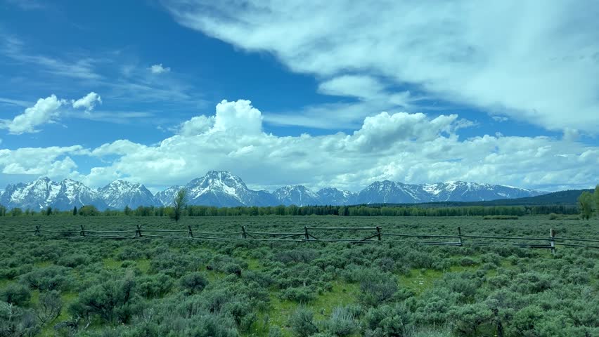 The Teton Mountain Range in Grand Teton National Park near Jackson Hole, Wyoming on a beautiful cloudy day.