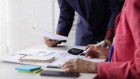 Meeting to discuss business consultant analyzing financial data in accounting and planning budget, statistical data analysis. - Powered by Shutterstock - Get 15% off with code: PIKWIZARD15