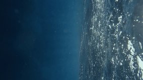 Vertical video, Underwater view on storm waves on evening time in Mediterranean sea
