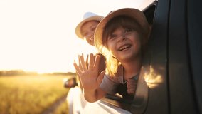 group of children travels by car. travel family vacation summer adventure by car concept. group of children in an open car rides in park. family travel by car concept sun - Powered by Shutterstock - Get 15% off with code: PIKWIZARD15