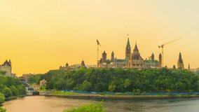 4k time-lapse over Parliament Hill to the Library of Parliament in golden hour. Ottawa, Ontario, Canada