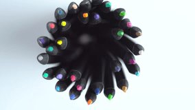 Top view of sharpened multi colored drawing pencils, rotating in a circle. Pile of colored pencils, top view, close-up.  - Powered by Shutterstock - Get 15% off with code: PIKWIZARD15