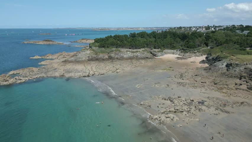 Beach of Roche Pelee, Dinard in Brittany, France. Aerial drone view forward