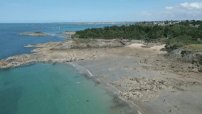 Beach of Roche Pelee, Dinard in Brittany, France. Aerial drone view forward