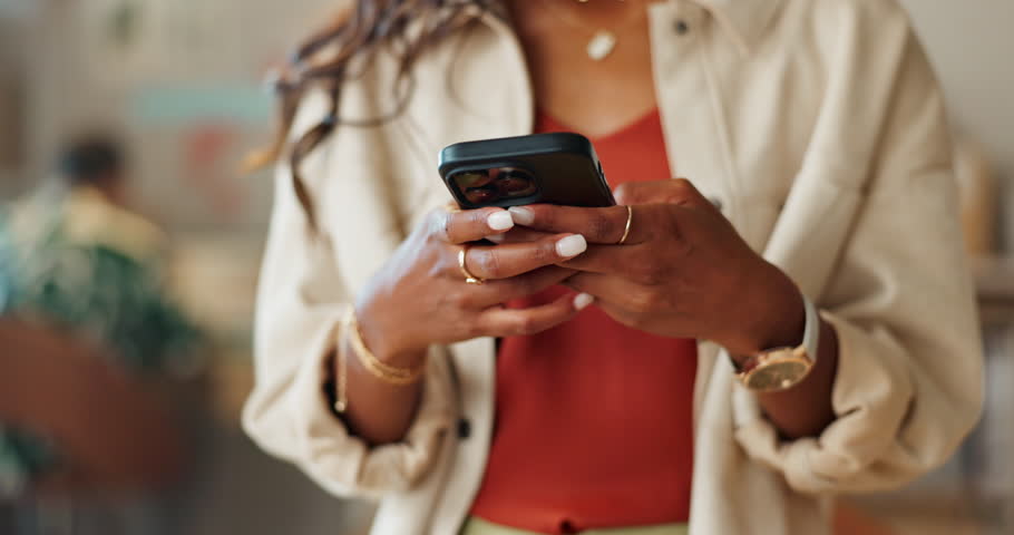 Business woman, hands and phone for social media, communication or online networking at office. Closeup of female person or employee on mobile smartphone in chatting, texting or research at workplace