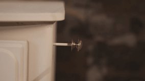 Handle on chest of drawers - Powered by Shutterstock - Get 15% off with code: PIKWIZARD15