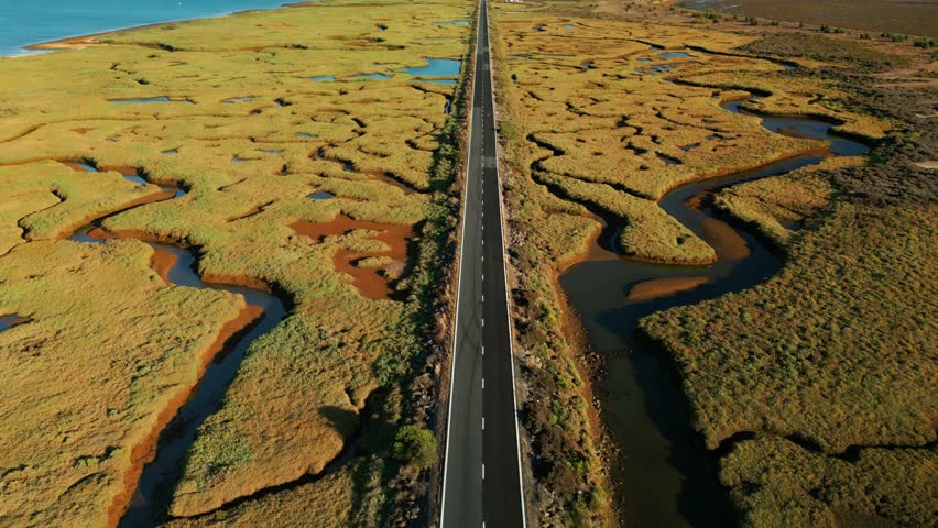 A straight road over the river basin