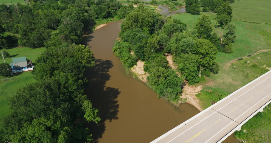 Idyllic Scenery Of River With Lush Green Vegetation - Illinois River In Arkansas, USA - aerial shot