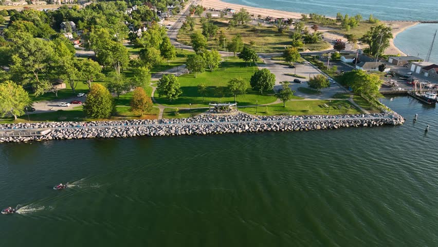 Rising and rotating from the shore to reveal the lovely coastline of Lake Michigan.