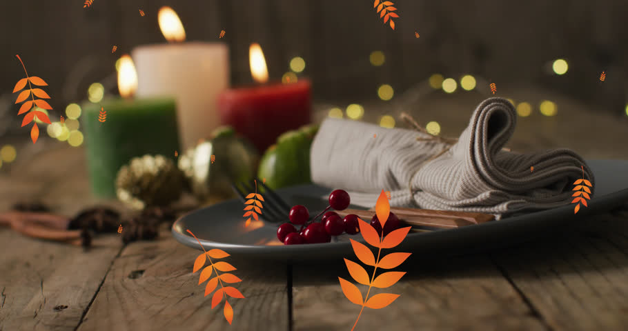 Animation of autumn leaves over thanksgiving dinner place setting background. Thanksgiving, american tradition and celebration concept digitally generated video. Royalty-Free Stock Footage #1110134629