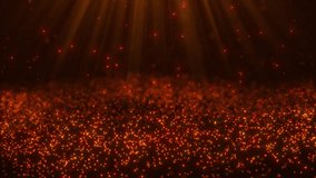 Abstract golden glowing particles rise up and are illuminated by bright rays of light, a background of bright orange particles and beautiful bokeh. seamless loop animation.
