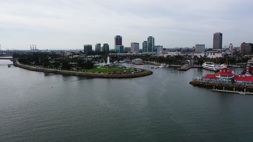 Aerial view toward an event at the Lion Lighthouse, in cloudy Long beach, USA