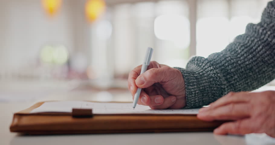 Elderly man, hands and writing on documents for retirement plan, legal agreement or application at home. Closeup of senior male person signing paperwork, form or finance for investment at house Royalty-Free Stock Footage #1110149971